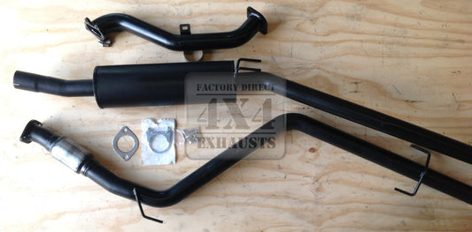 Image of a 2.5 inch Outback Exhausts  turbo back system designed for a 7Holden Rodeo 2.8L 4JB1 engine 4WD only. The system features mandrel bent 409 Stainless Steel pipes and muffler displayed against a wooden background.  SKU OE1402-S